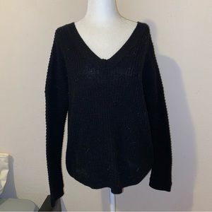 black knit v neck sweater